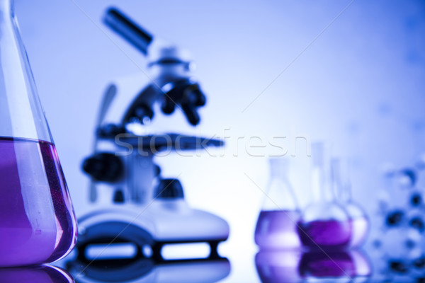 Stock photo: Laboratory work place with microscope and glassware