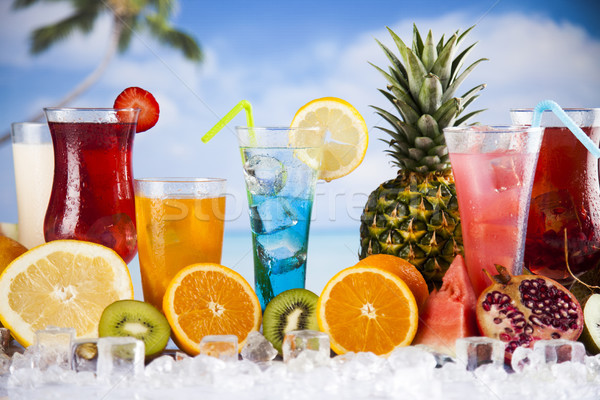 Summer drink, palm branch and Fresh tropical fruits Stock photo © JanPietruszka