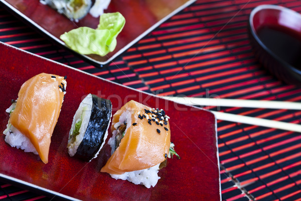 Tradicional comida japonesa sushi peixe tabela bambu Foto stock © JanPietruszka