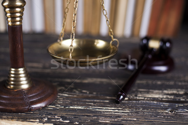 Law book, mallet of the judge, justice scale, wooden desk backgr Stock photo © JanPietruszka