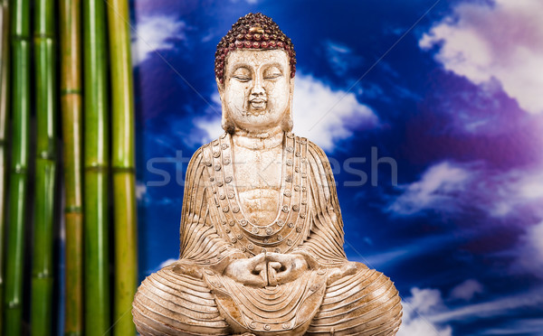 Buddha and blue sky background  Stock photo © JanPietruszka