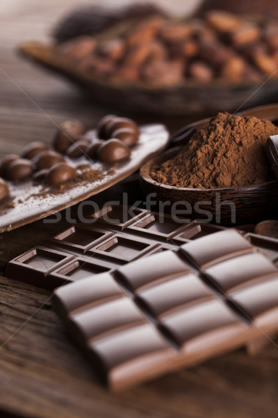 Chocolate bar, candy sweet, dessert food on wooden background Stock photo © JanPietruszka