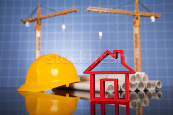 Crane, Safety helmet, Blueprints and construction site Stock photo © JanPietruszka
