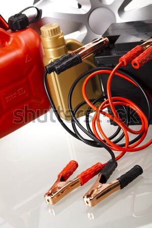 Car battery with two jumper cables clipped on vivid moto concept Stock photo © JanPietruszka