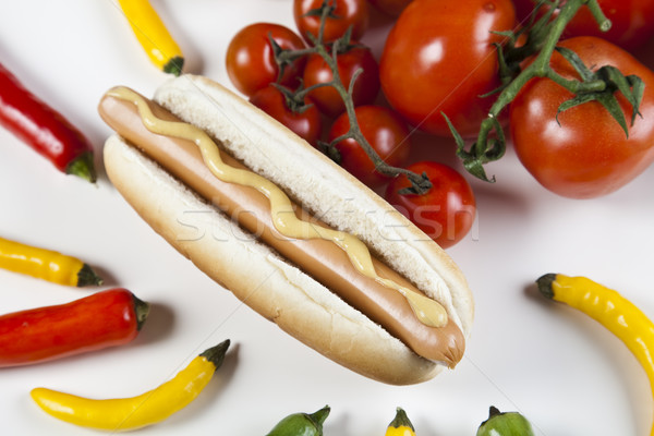 Geïsoleerd hot dog heldere kleurrijk levendig achtergrond Stockfoto © JanPietruszka