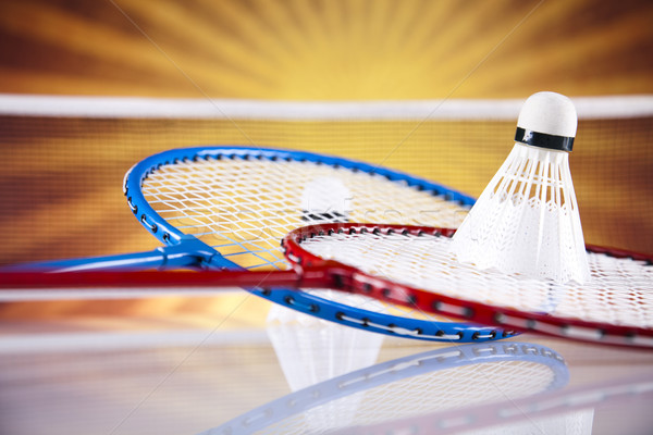 Stock photo: Shuttlecock on badminton racket 