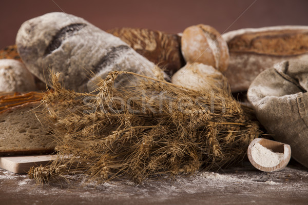 Baked bread on wood table Stock photo © JanPietruszka