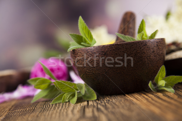 Stock photo: Natural remedy, mortar and herbs