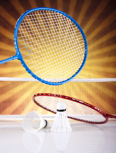 Stock photo: Shuttlecock on badminton racket 