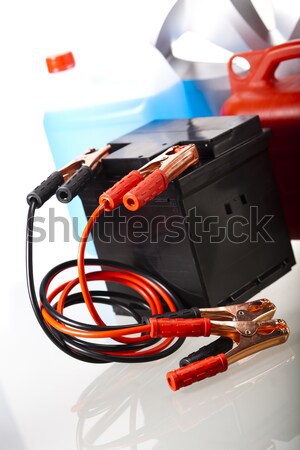 Car battery with two jumper cables clipped on vivid moto concept Stock photo © JanPietruszka