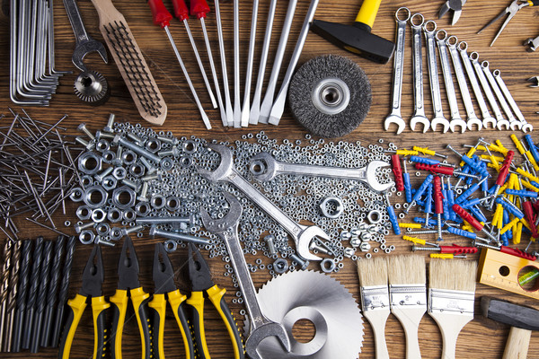 Assorted work tools on wood background Stock photo © JanPietruszka
