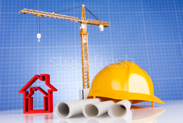 Crane, Safety helmet, Blueprints and construction site Stock photo © JanPietruszka