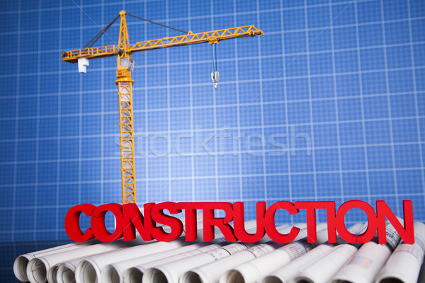Crane, Safety helmet, Blueprints and construction site Stock photo © JanPietruszka