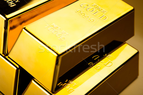 Coins and gold bars, ambient financial concept Stock photo © JanPietruszka