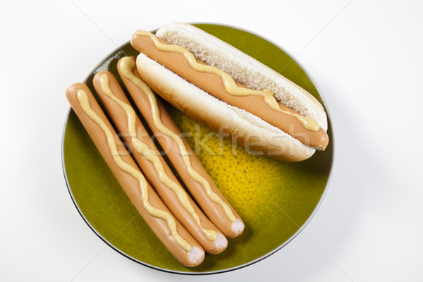 Geïsoleerd hot dog heldere kleurrijk levendig achtergrond Stockfoto © JanPietruszka