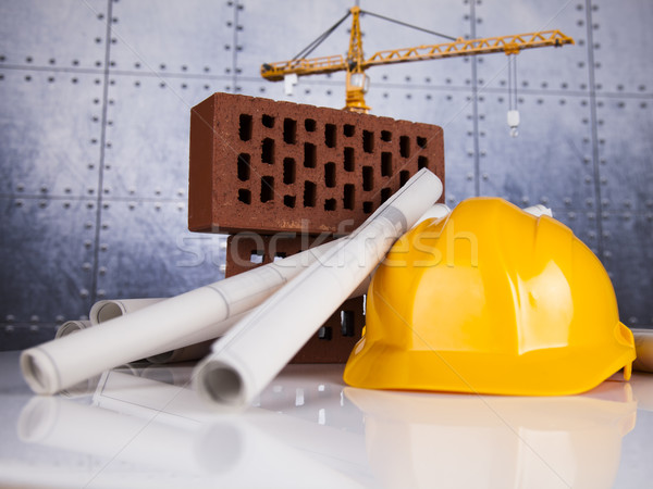 Stock photo: Crane, Safety helmet, Blueprints and construction site