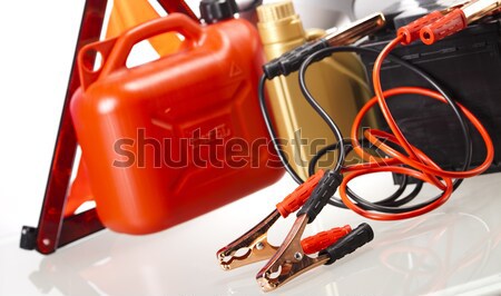 Car battery with two jumper cables clipped on vivid moto concept Stock photo © JanPietruszka