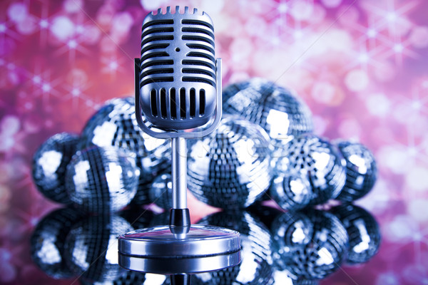 Stock photo: Music background, microphone and Disco Balls 