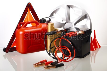 Car battery with two jumper cables clipped on vivid moto concept Stock photo © JanPietruszka