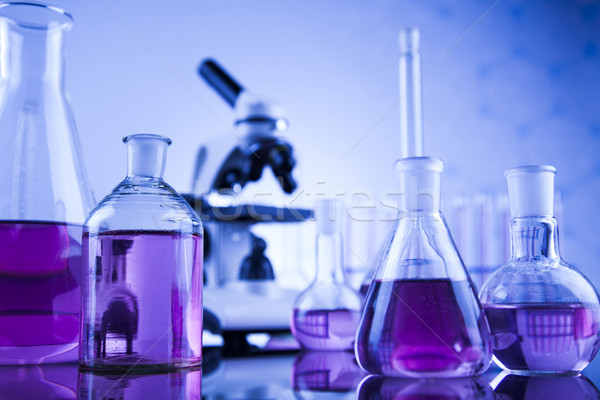 Stock photo: Microscope in medical laboratory glassware