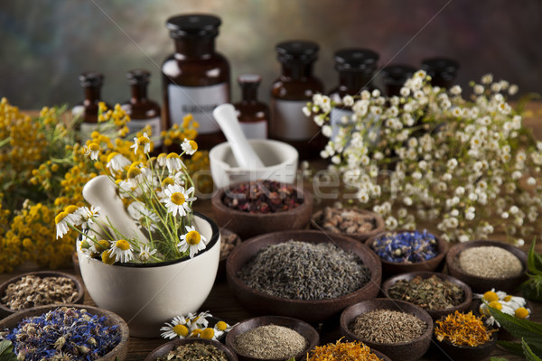 Medicine bottles and herbs background Stock photo © JanPietruszka
