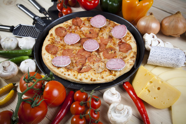 Hot pizza, tasty natural food theme Stock photo © JanPietruszka