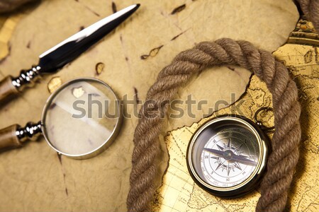 Stock photo: Old style compass and paper background