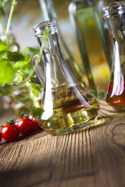 Olive oils in bottles, Mediterranean rural theme Stock photo © JanPietruszka