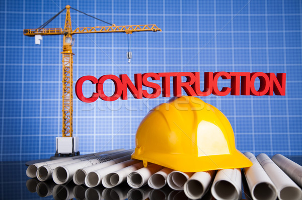 Stock photo: Project drawings, building and cranes under construction