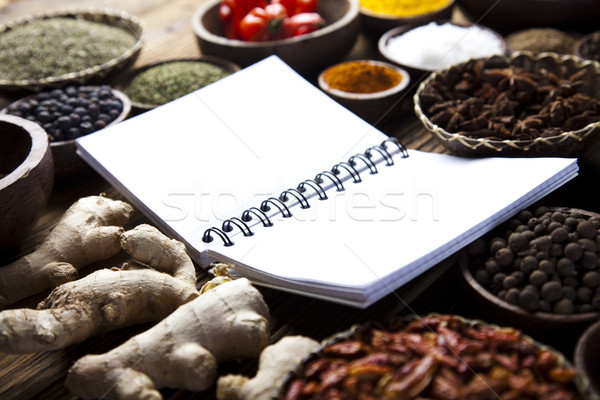 Cookbook and various spices, orintal cuisine vivid theme Stock photo © JanPietruszka