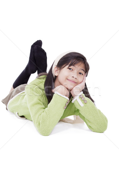 Eleven year old girl lying on floor relaxing Stock photo © jarenwicklund