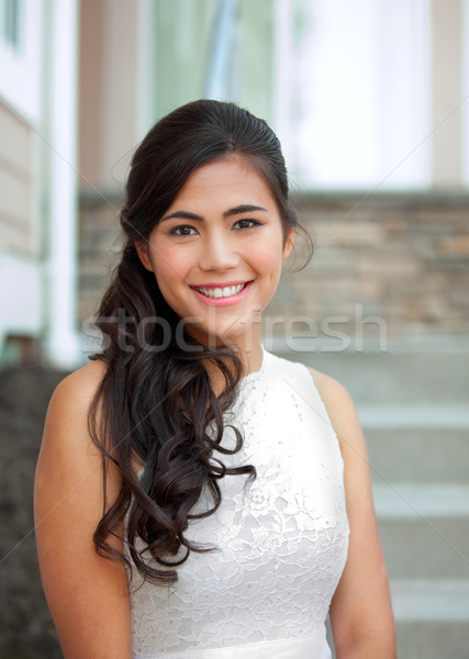 Beautiful biracial bride in white lace wedding dress, smiling Stock photo © jarenwicklund