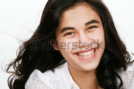 Beautiful biracial teen girl smiling, isolated Stock photo © jarenwicklund