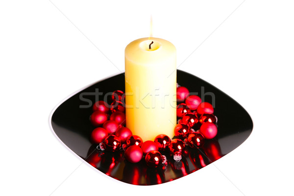 Groß weiß Kerze Brennen rot Ornamente Stock foto © jarenwicklund