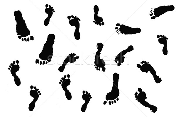 Black silhouette outlines of actual children's footprints on white Stock photo © jarenwicklund