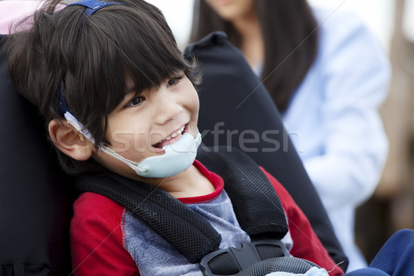 Gelukkig gehandicapten jongen rolstoel medische Stockfoto © jarenwicklund