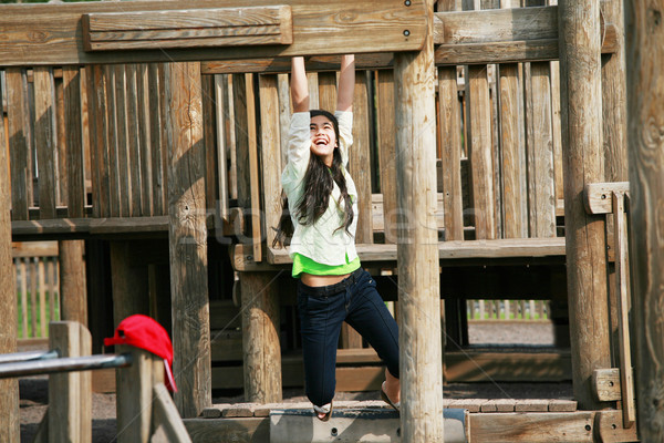 Teenage girl playing at playground Stock photo © jarenwicklund