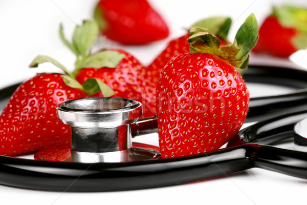 Healthy snack,  Stethoscope with strawberries isolated Stock photo © jarenwicklund