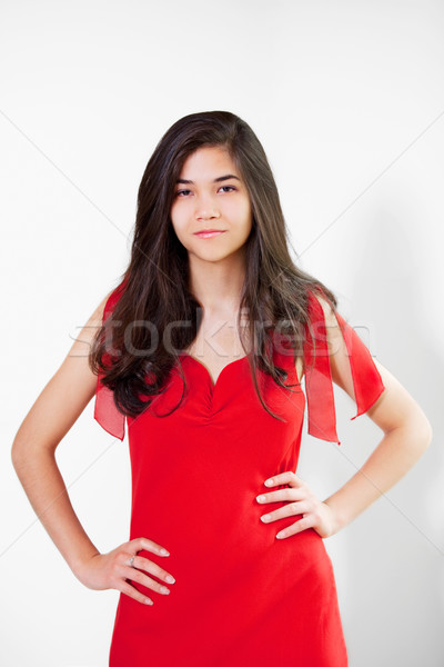 Beautiful biracial teen girl in elegant red dress Stock photo © jarenwicklund