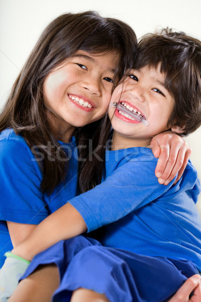 Big sister holding her disabled little brother Stock photo © jarenwicklund