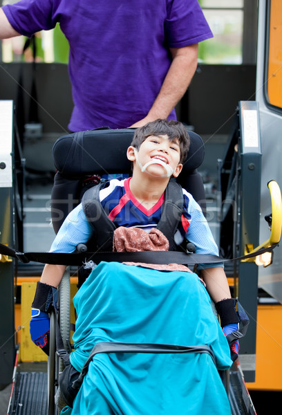 Disabled boy riding on school bus lift Stock photo © jarenwicklund