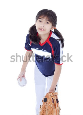 Little girl in softball team uniform ready to throw a pitch Stock photo © jarenwicklund