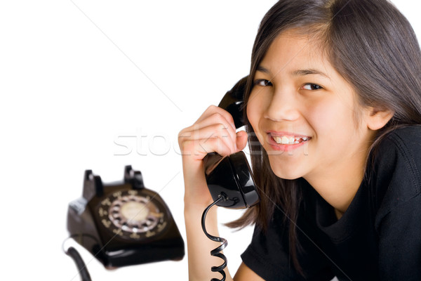 Fiatal lány beszél ódivatú telefon lány boldog Stock fotó © jarenwicklund
