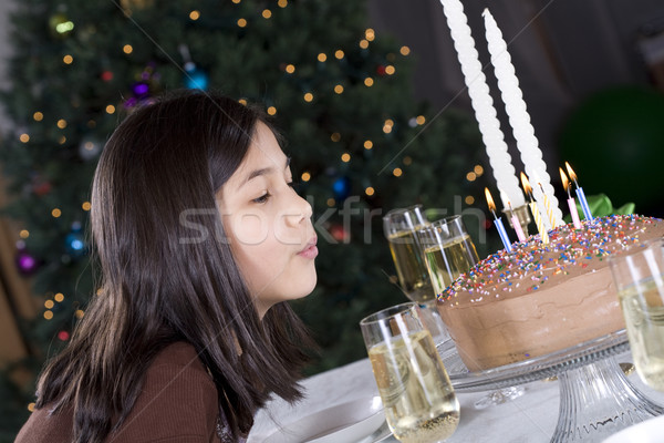 Little girl blowing out her birthday  candles Stock photo © jarenwicklund