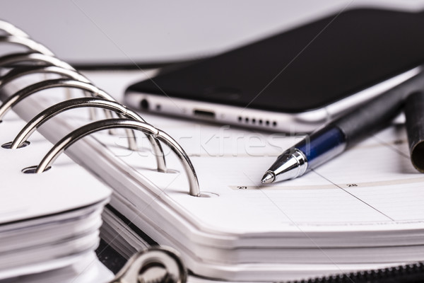 planning concept - calendar, cellphone, pen Stock photo © jarin13