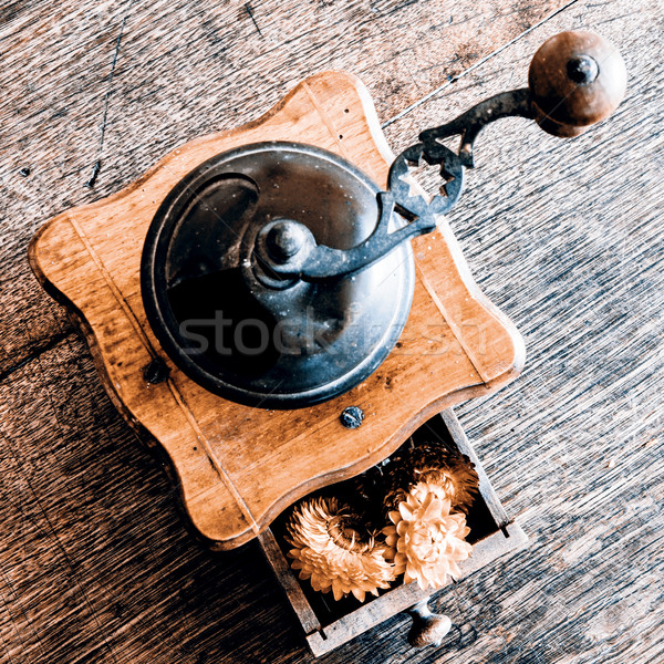 Vintage wooden coffee mill grinder with yellow flowers in open d Stock photo © jarin13