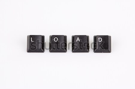 load word written with black computer buttons over white Stock photo © jarin13