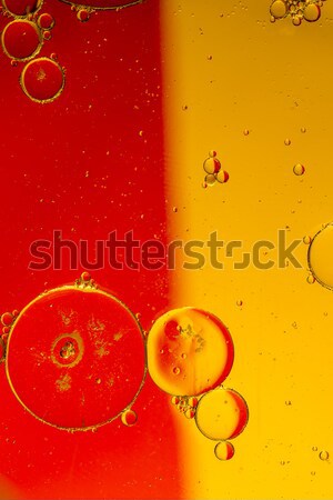 Oil drops on a water surface Stock photo © jarin13