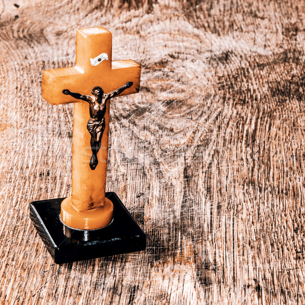 Beautiful old cross with jesus on the old wooden floor Stock photo © jarin13