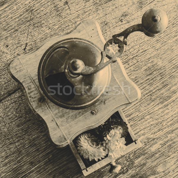 Vintage wooden coffee mill grinder with yellow flowers in open d Stock photo © jarin13